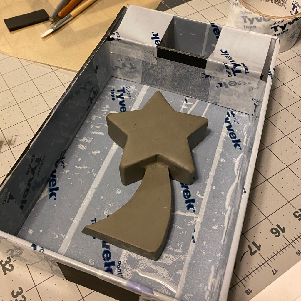 Clay Little Star sculpture to create a silicone mold