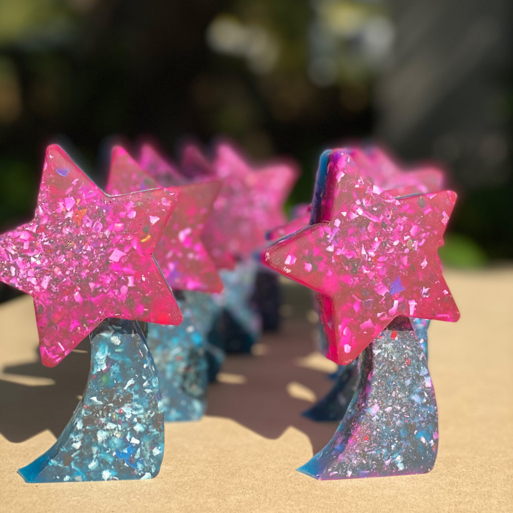 The top section of the Little Star trophies for The Children's Trust's Stay Home Miami summer reading program Battle of the Books