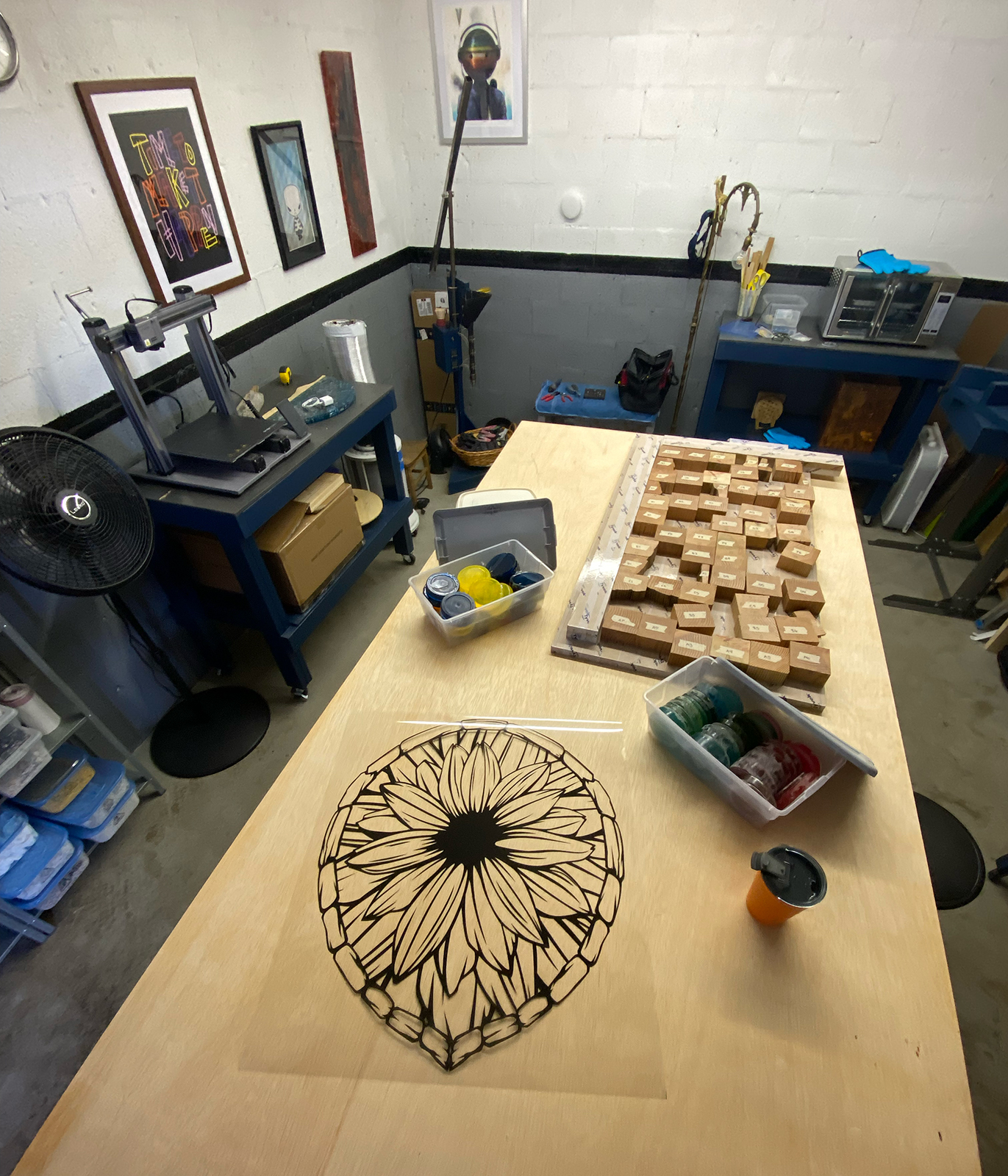 Our project table and various workstations in our original HQ